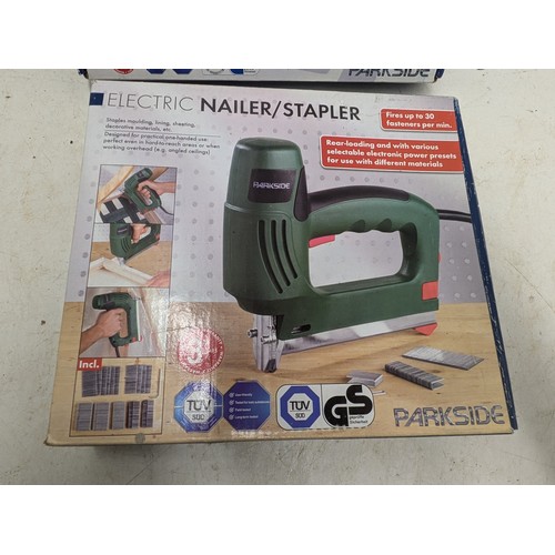 1604 - A pair of unused and unopened Parkside tools- a electric nailer/ stapler and cordless power screwdri... 