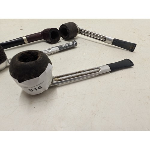 816 - A selection of four vintage smokers tobacco pipes