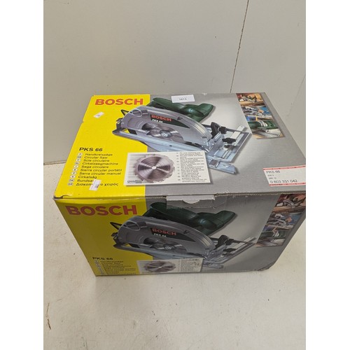 1613 - A Boxed Bosch PKS 66 Corded Circular Saw - unused and Boxed with 2 Blades