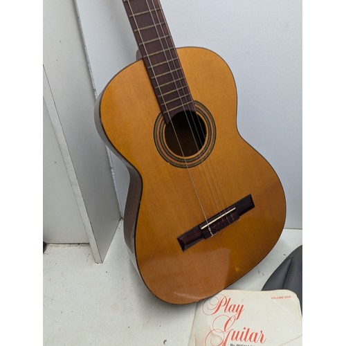 1822 - A Full size acoustic guitar in vinyl carry case