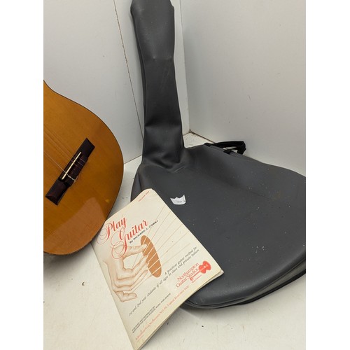 1822 - A Full size acoustic guitar in vinyl carry case