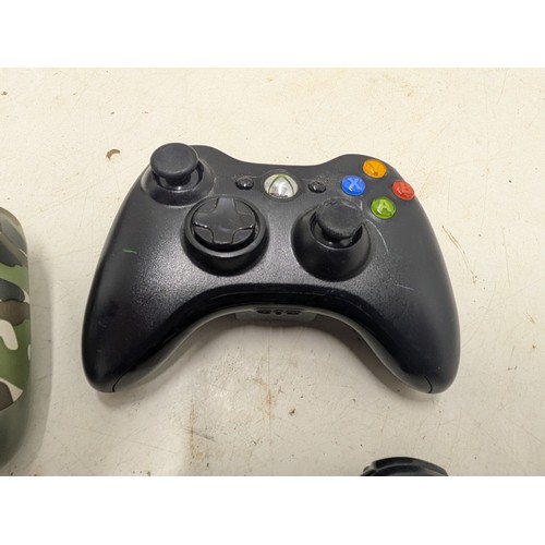 1217 - A Selection of Gaming Controllers Including a Playstation 4 Official Camo Controller