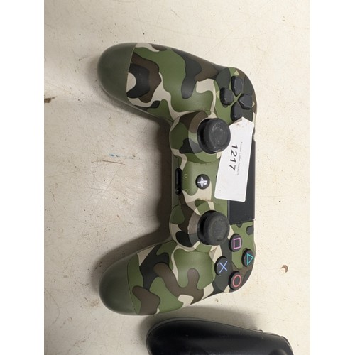 1217 - A Selection of Gaming Controllers Including a Playstation 4 Official Camo Controller