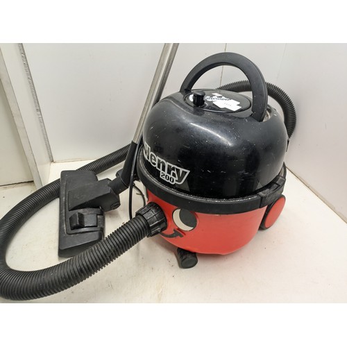 1211 - A Numatic Henry 200 Vacuum Cleaner With Accessories - working