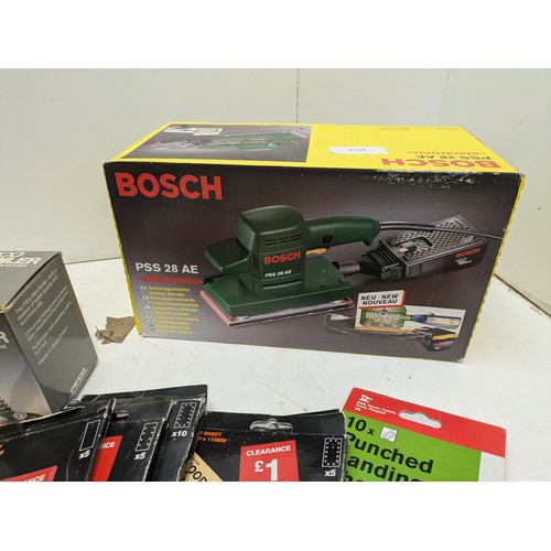 1612 - A Bosch PSS28AW Corded Sander With a Selection of Sand Paper - all new and unused