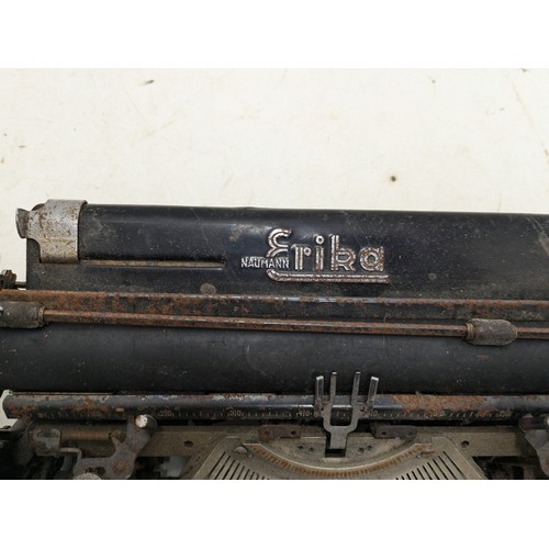 858 - A Vintage Erika Norman Cast Iron Typewriter