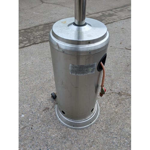 17 - A large stainless steel patio garden heater by Neptune Limited