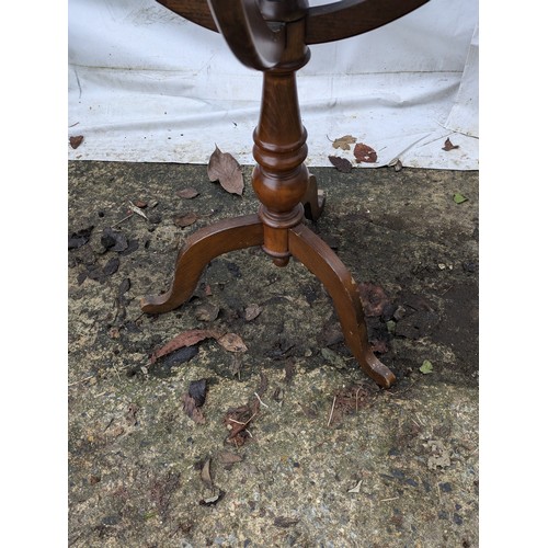 893 - An Antique Style Globe on an Oak Stand