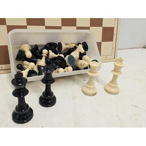 1924 - A Chess Set With Board and Pieces