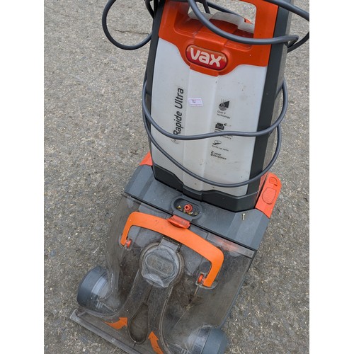 1209 - A Vax Rapid Ultra Model IPX4 Carpet Cleaner With Attachments