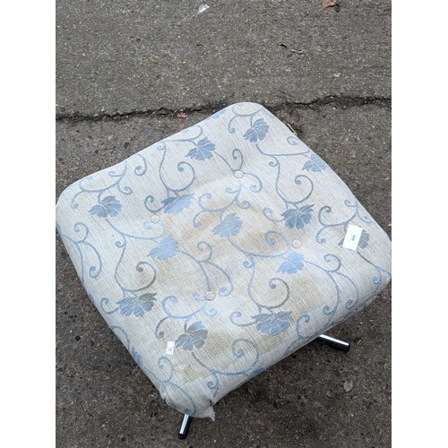 444 - An Upholstered White and Floral Fabric Foot Stool With a Chrome Base