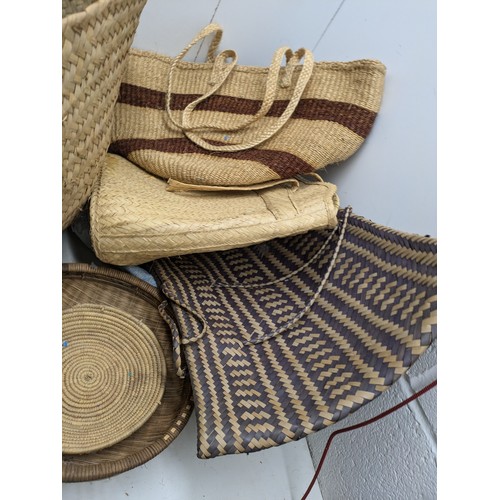 1803 - A Large selection of wicker baskets, bags and bowls