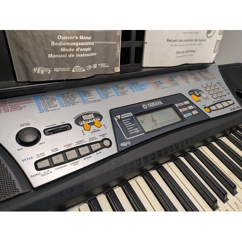 1228 - A Yamaha PSR-175 Electronkc Keyboard With Power supply, case, music books and manual - working