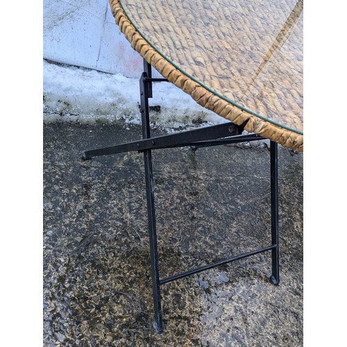 201 - A Metal Framed Wicker And Glass Topped Conservatory Table