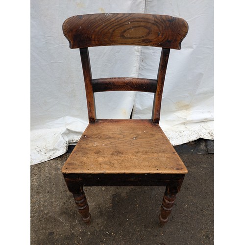 637 - a pair of antique chairs - stained oak, one rural design and one ornate with wicker base and back