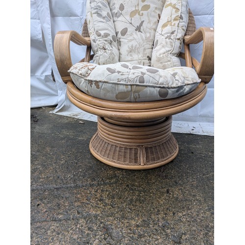 639 - A Wicker and Oak Vernier Lounge Chair, With Gold And Cream Floral Patterned Cushioms