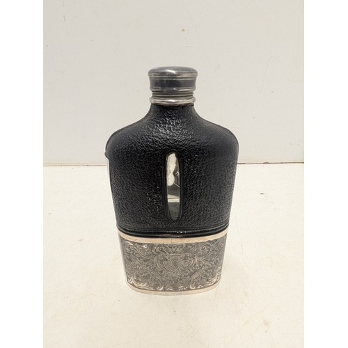 1018 - A Lovely silver plated and Leather Flask