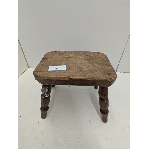 1057 - A Charming miniature foot stool with turned legs