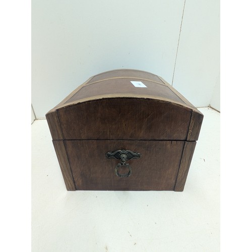 1063 - An antique styled Oak Jewellery box with brass features