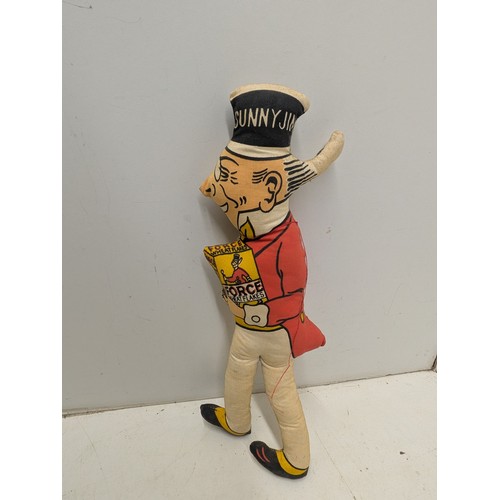 1014 - A Vintage Sunny Jim plush toy holding a box of Force Cereal