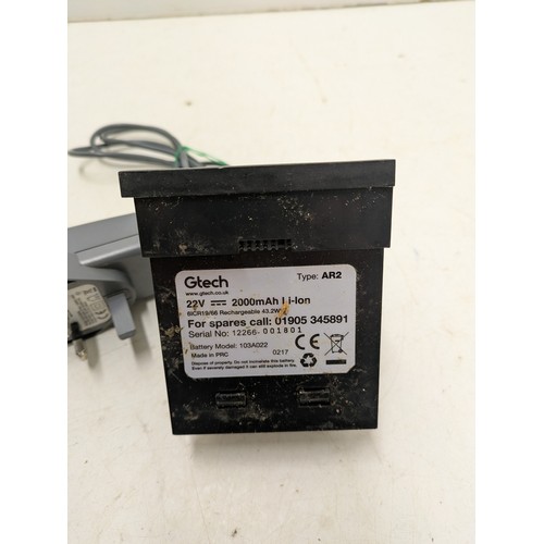 1478 - A Gtech Air Ram AR2 Battery with Charger - charger working and battery holding charge