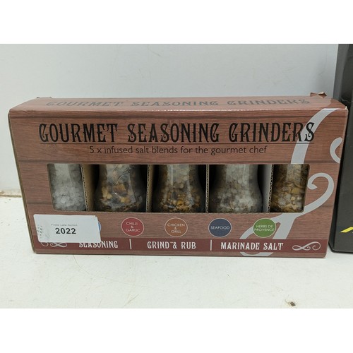 2022 - Gourmet seasoning grinders and a chili sauce selection - both unused