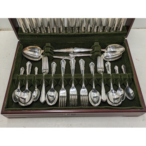 1036 - A full set of orchid royal bronze EPNS Butlers Heirloom Collection Cutlery set in a chestnut vernier... 