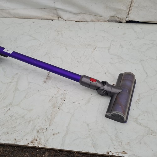 1464 - A Dyson V7 Animal Extra Vacuum Cleaner - Working with attachments and Charger (Please note we do not... 