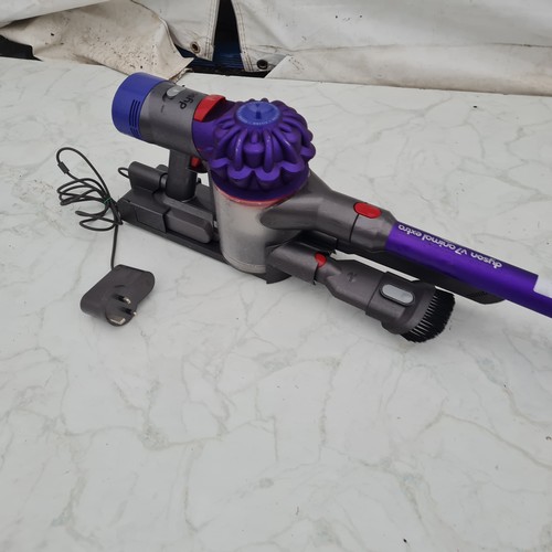 1464 - A Dyson V7 Animal Extra Vacuum Cleaner - Working with attachments and Charger (Please note we do not... 