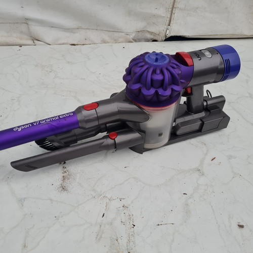 1464 - A Dyson V7 Animal Extra Vacuum Cleaner - Working with attachments and Charger (Please note we do not... 