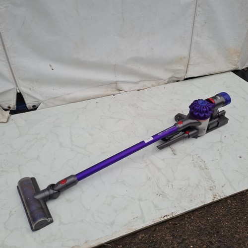 1464 - A Dyson V7 Animal Extra Vacuum Cleaner - Working with attachments and Charger (Please note we do not... 