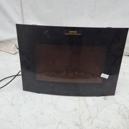 1412 - An Electronic Fireplace Heater with illuminating back panel