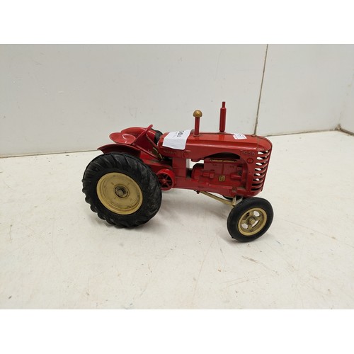 1003 - A Vintage Massey and Harris 745D Die Cast Tractor with Hitch