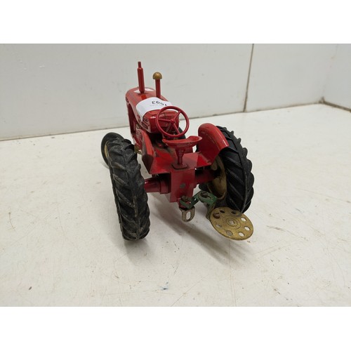 1003 - A Vintage Massey and Harris 745D Die Cast Tractor with Hitch