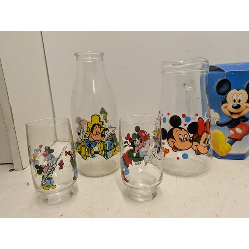 2063 - A quantity of vintage and modern Walt Disney cups, mugs and glassware,and a selection of political c... 