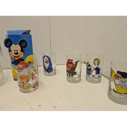 2063 - A quantity of vintage and modern Walt Disney cups, mugs and glassware,and a selection of political c... 