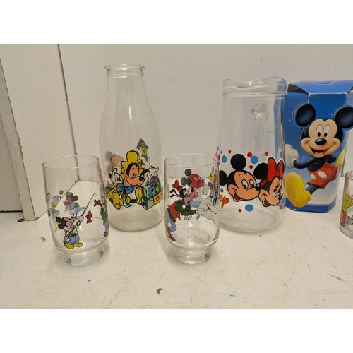 2063 - A quantity of vintage and modern Walt Disney cups, mugs and glassware,and a selection of political c... 