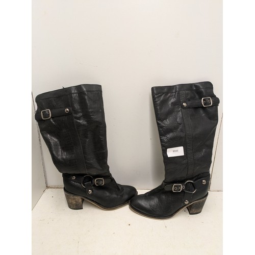 2058 - A pair of Leather designer womens boots - Size 4