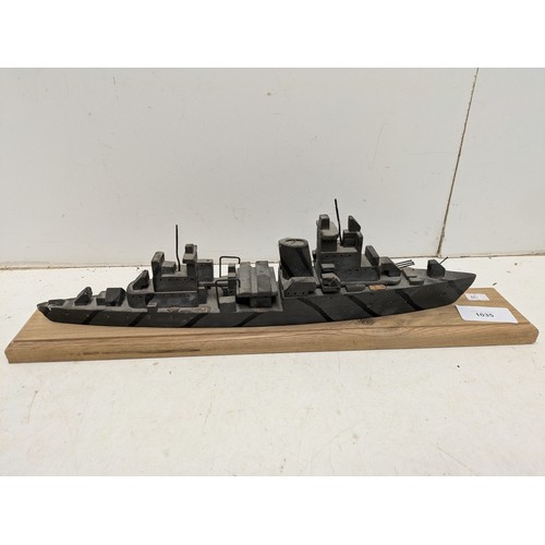 1035 - A Small hand crafted oak and pine battleship model