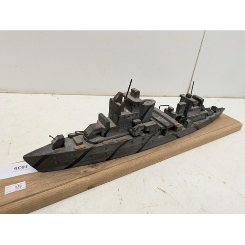 1035 - A Small hand crafted oak and pine battleship model