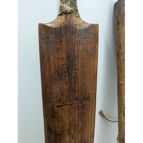 1010 - A Vintage Oak Cricket Bat with 7 Cricket Posts