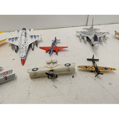 2042 - A collection of various die cast planes including military and civilian