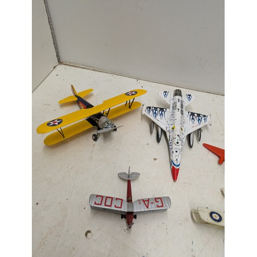 2042 - A collection of various die cast planes including military and civilian