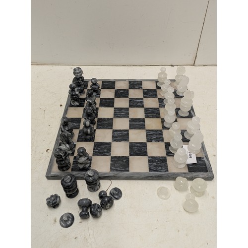 1062 - A Charming Marble Chess set with Marble board - one piece missing, some pieces damaged