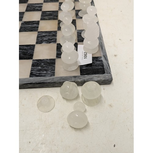 1062 - A Charming Marble Chess set with Marble board - one piece missing, some pieces damaged