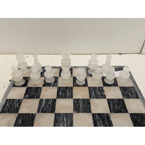 1062 - A Charming Marble Chess set with Marble board - one piece missing, some pieces damaged