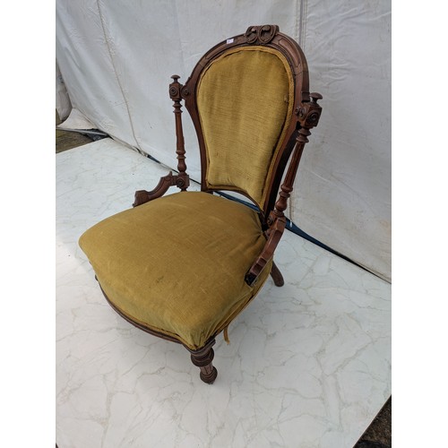 609 - A Small Oak chair with upholstered back and base - early 20th century