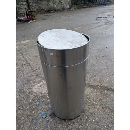 612 - A Large Stainless Steel revolving lid recycling bin