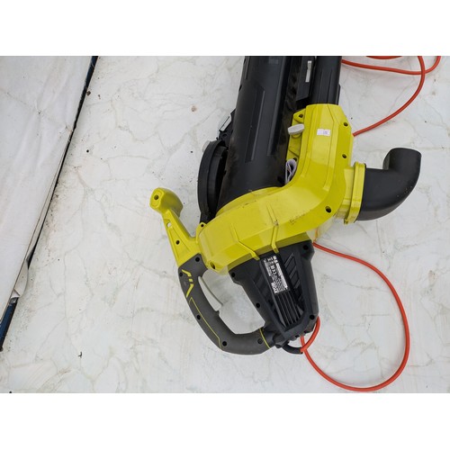 1703 - A Ryobi model rbv3000cesv01 corded garden vacuum