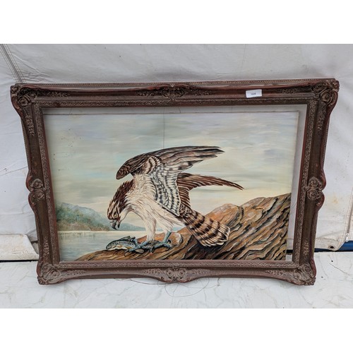 1048 - An oil on canvases painting of a hawk eating a fish by Winton, with a quality vintage wood carved fr... 